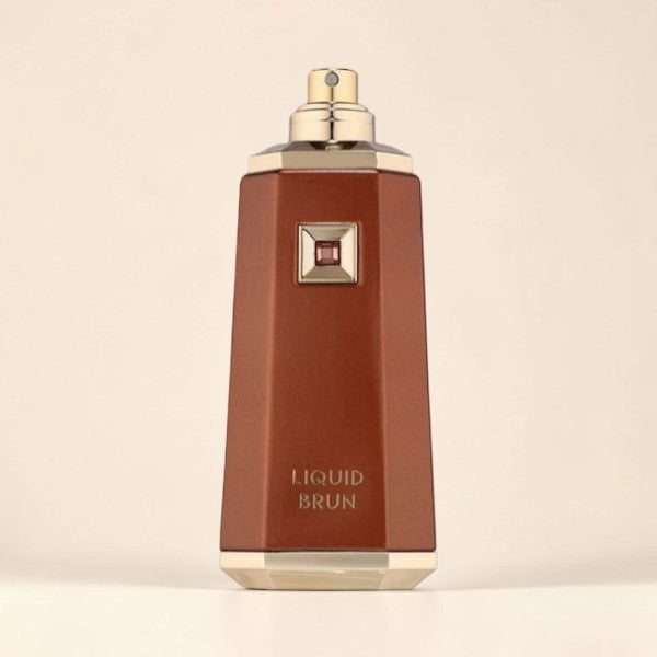 Oud Sera French Avenue Liquid Brun unisex eau de parfum in a sleek brown bottle with gold accents and a square emblem.